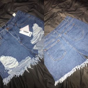 Destroyed high waisted shorts